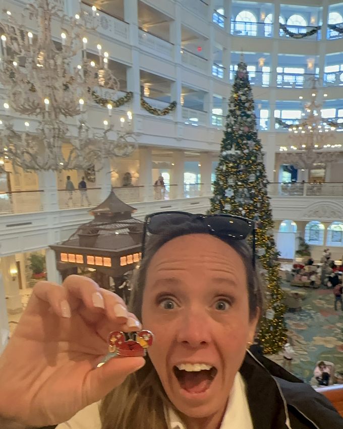Lynne thrilled with a pin find at the Grand Floridian